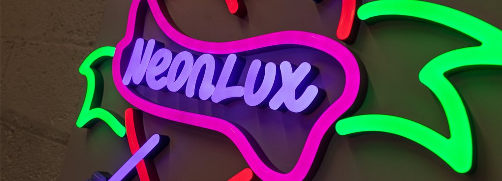 Artist creates fake neon signs with spray paint